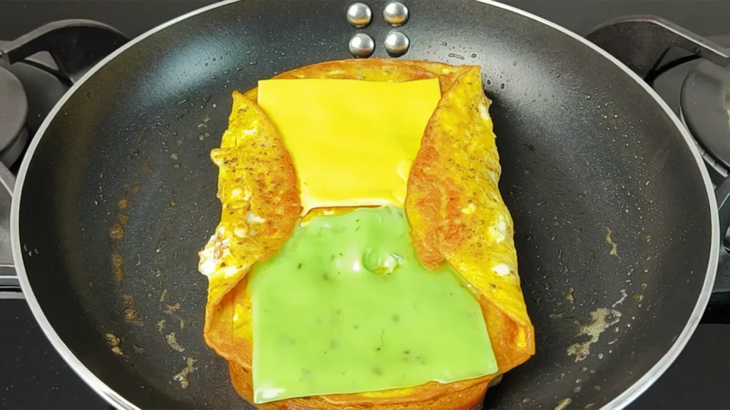 Cheesy Egg Toast Recipe - Toast soaking in Egg Mixture